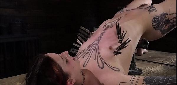  Tattooed brunette slave is vibrated